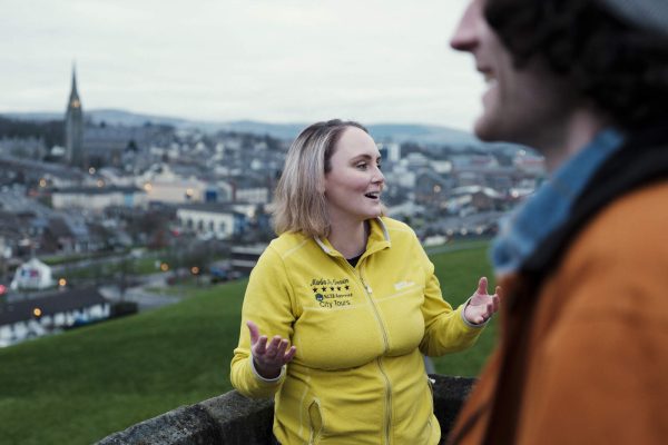 Friends enjoying the Derry Girls walking tour in Derry